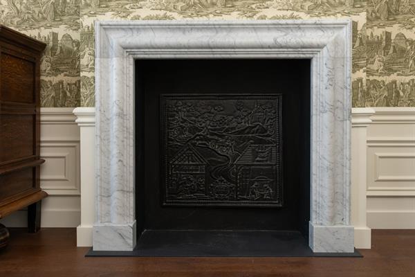 Marmer vloer, schouw en natuurstenen aanrechtblad | Steenhouwerij de Vries