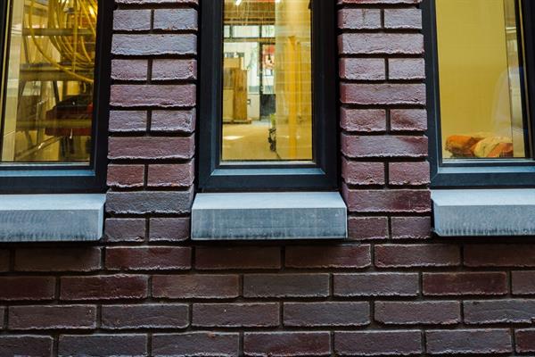 Hardstenen gevelbekleding | Steenhouwerij de Vries